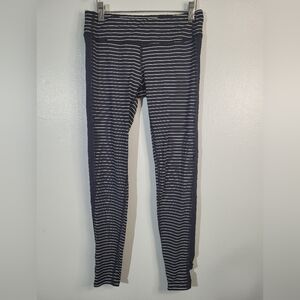 Woman Carve Designs Striped Leggings. Size XS. Navy blue with white stripes.